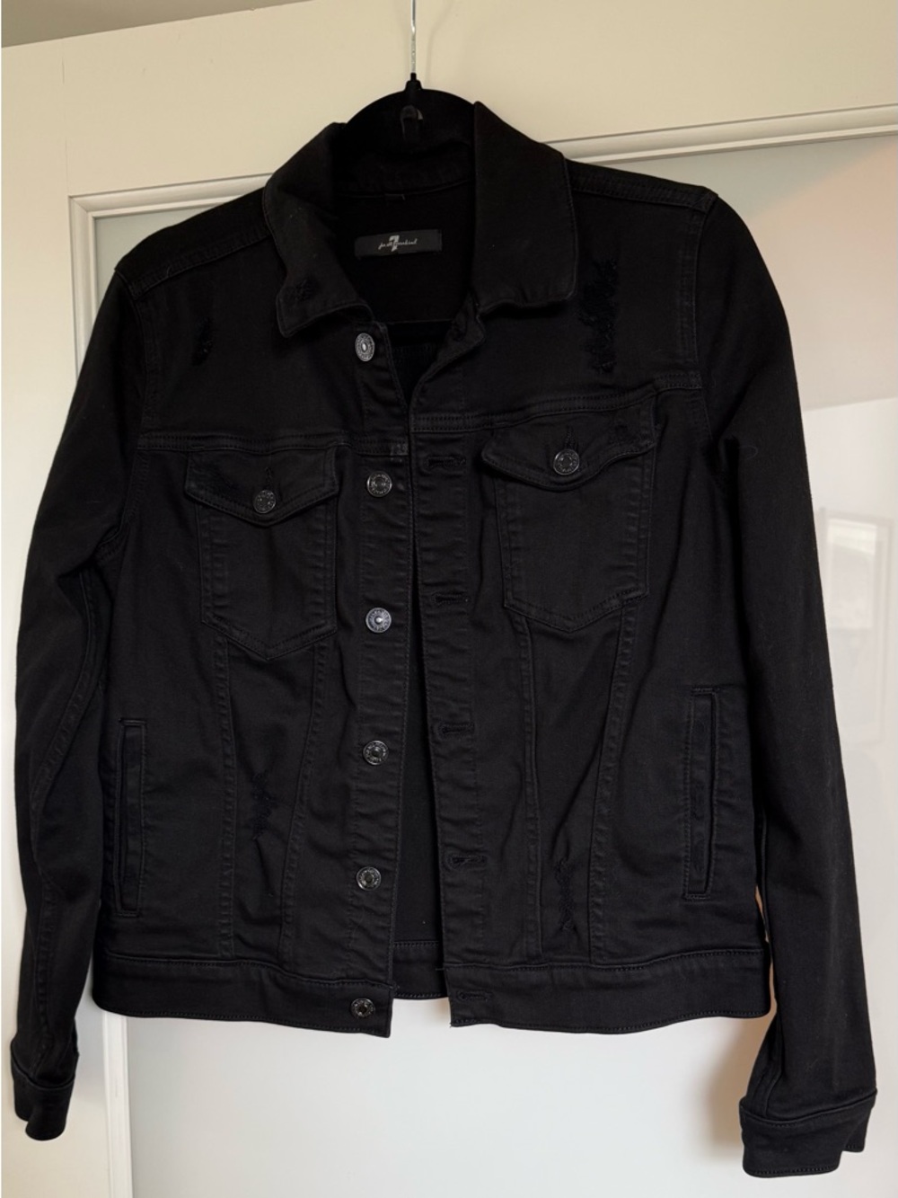 7 for all mankind denim trucker jacket size small in black.